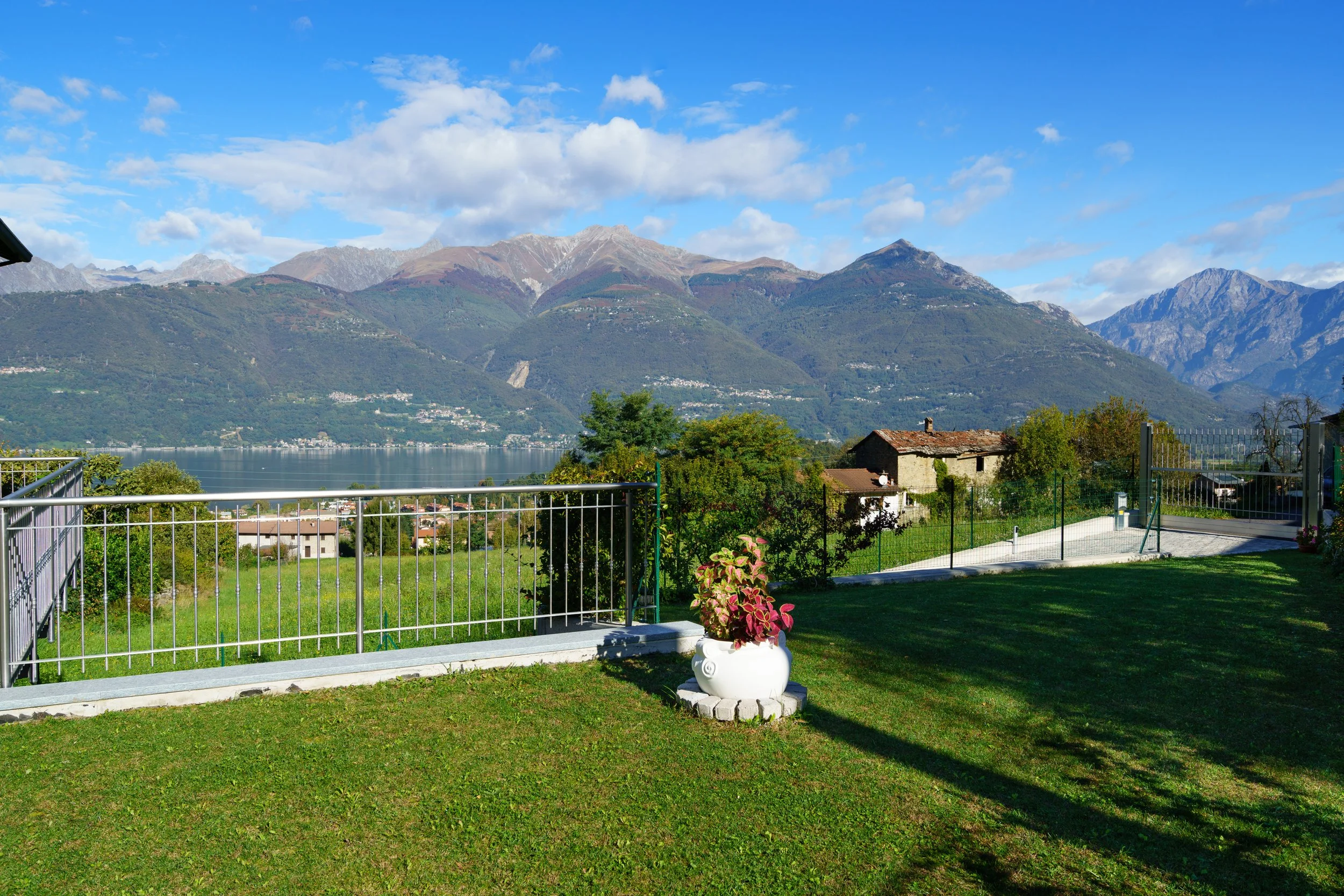 Terrace table and chairs overlooking Lake Como
